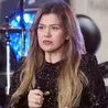 Kelly Clarkson says she needs to ‘protect’ herself as she shares devastating news